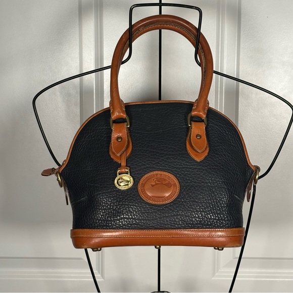 Dooney & Bourke Handbags - Dooney & Bourke Navy & Tan All Weather Leather Domed Satchel